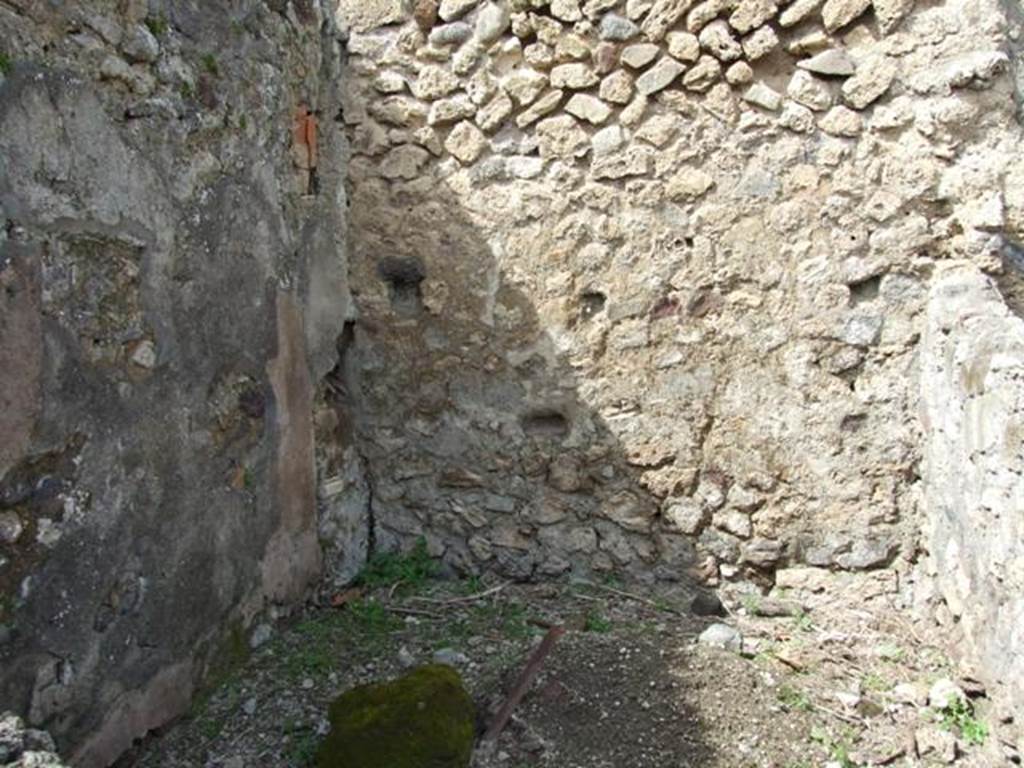 VI.16.28 Pompeii. March 2009. Room B, north wall. According to Hobson, there are three down-pipes in this property, two of which may be associated with upper floor latrines. A down-pipe can be seen in the north-west corner of room B. See Hobson, B. 2009. Pompeii, Latrines and Down Pipes. Oxford, Hadrian Books, (p.290,294-5)
