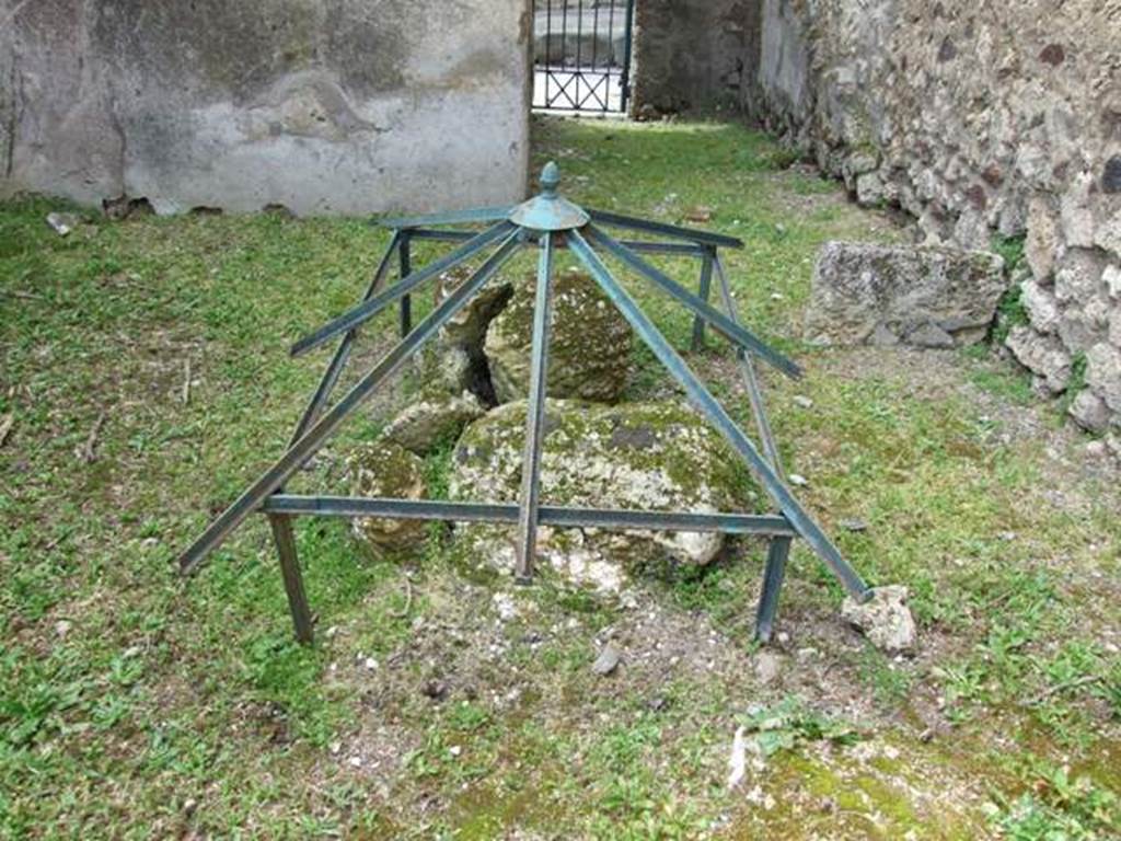 VI.16.29 Pompeii. March 2009. Looking west across room O, site of impluvium or well in atrium of VI.16.30. Found here and left in their place, but well defended with glass from the weather, two large loads of slaked lime, showing the imprints of the matting in which they were contained. See Notizie degli Scavi di Antichità, 1908, (p.284, and fig 9 on p.285).