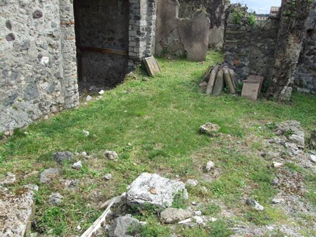VI.16.29 Pompeii. March 2009. Demolished wall and site of room I, on east side of atrium.
According to NdS, this room was a rustic room and perhaps may have been uncovered which would have let light into the atrium through the large window. According to Sogliano, high up on the left of the east wall were two semicircular niches. In the middle part of the same wall was a big window. In the south-east corner was a hearth. To the west of the doorway to room H, running north to south, was a small low wall (b) on which were found traces of wood covering. See Notizie degli Scavi di Antichità, 1908, (p. 280). See also Giacobello, F., 2008. Larari Pompeiani: Iconografia e culto dei Lari in ambito domestico. Milano: LED Edizioni. (p.243).