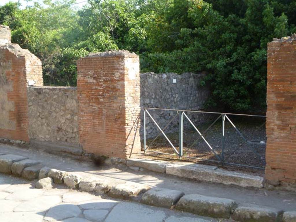 VI.17.9, on left, and VI.17.8, on right, Pompeii. May 2011. Looking south-west towards the entrance doorways. Photo courtesy of Michael Binns.
