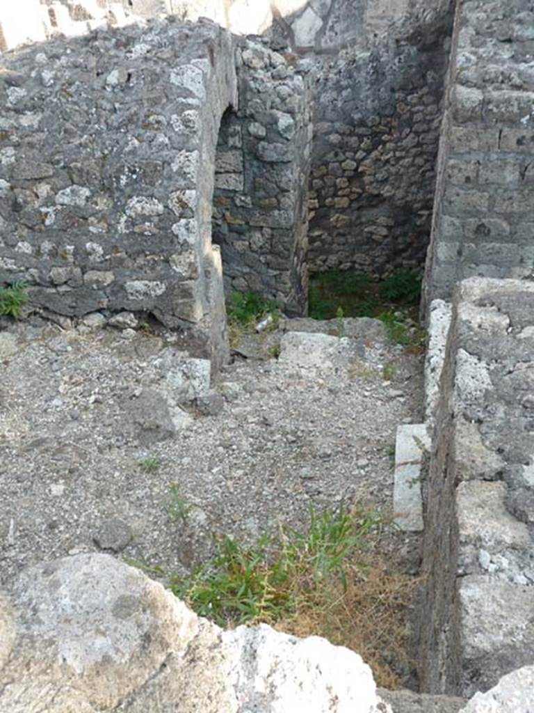 VI.17.10 Pompeii. September 2015. Looking south from entrance towards stairs to lower floor, (see VI.17.11). The doorway on right, would lead to the south-east corner of the atrium.