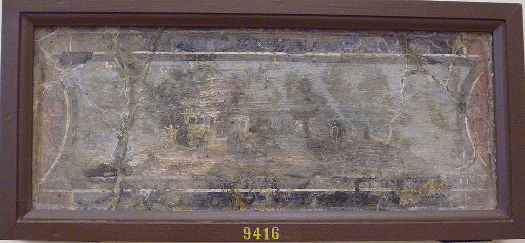 VI.17.25 Pompeii?
Wall painting of an architectural landscape. Now in Naples Archaeological Museum. Inventory number 9416.
This may or may not have been found in this house.
According to Lucio Rocco –
“9415 and 9416 – The two paintings provenanced from the same wall are united, as well as by the subject of river landscape with buildings among trees, by the shape of the frame with short curved sides.”
According to the index (p.544), these are from Casa del Leone, VI.Ins.Occ.25 (?).
See La Pittura Pompeiana, ed by Irene Bragantini and Valeria Sampaolo, (p.402-3)