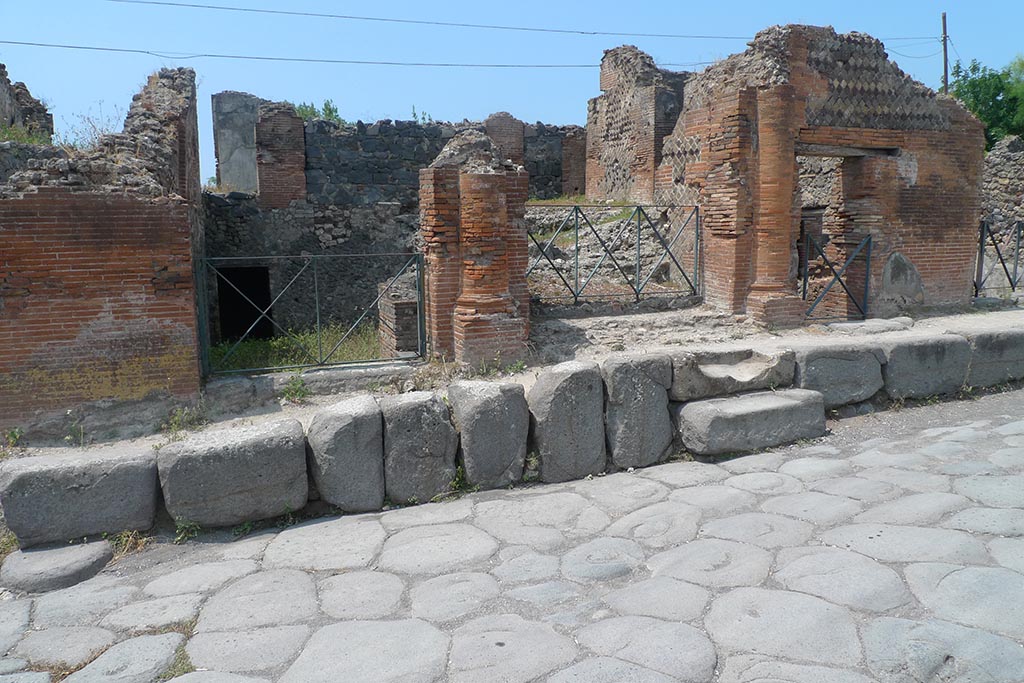 VI.17.36 Pompeii. July 2010. Looking west to entrance doorways of VI.17.37, 36 and 35. Photo courtesy of Michael Binns.