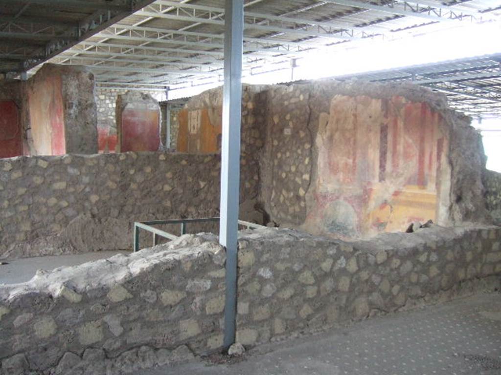 VI.17.41 Pompeii. May 2006. Looking south-west at west wall of room with painted decoration, on south side of atrium.