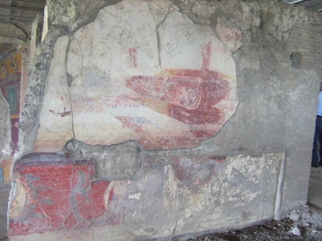 VI.17.41 Pompeii. May 2006. North wall of tablinum with remains of painting of a ship or ships. According to Eleanor Winsor Leach “above a dado supported by telamones stand the prows of two large ships, each resting on its own rectangular pedestal base”.
See Winsor Leach, E., 2004. The Social Life of Painting in Ancient Rome and on the Bay of Naples. Cambridge UK: Cambridge UP. (p.69 onwards)