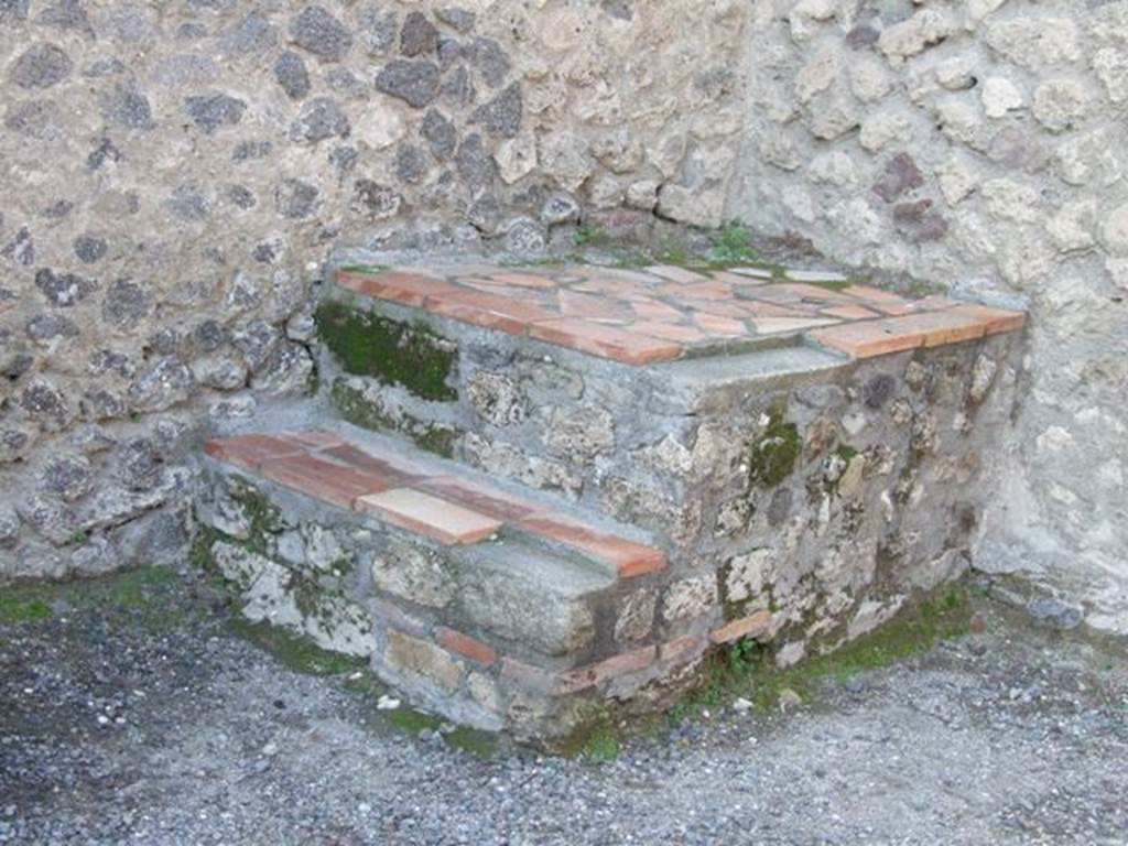 VII.1.5 Pompeii. Shop. December 2007. Base of stairs in north west corner.