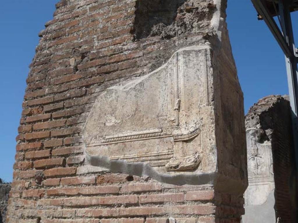 VII.1.8 Pompeii. May 2012. East side of pilaster on south side of nymphaeum G entrance. Photo courtesy of Buzz Ferebee.