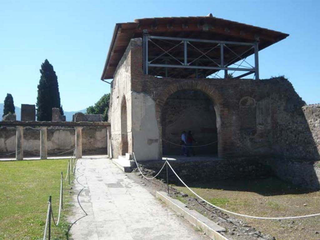 VII.1.8 Pompeii. May 2012. Looking south along the west side of gymnasium C, the west portico. The west portico may have formed a bowling court as stone balls were found here. Photo courtesy of Buzz Ferebee.