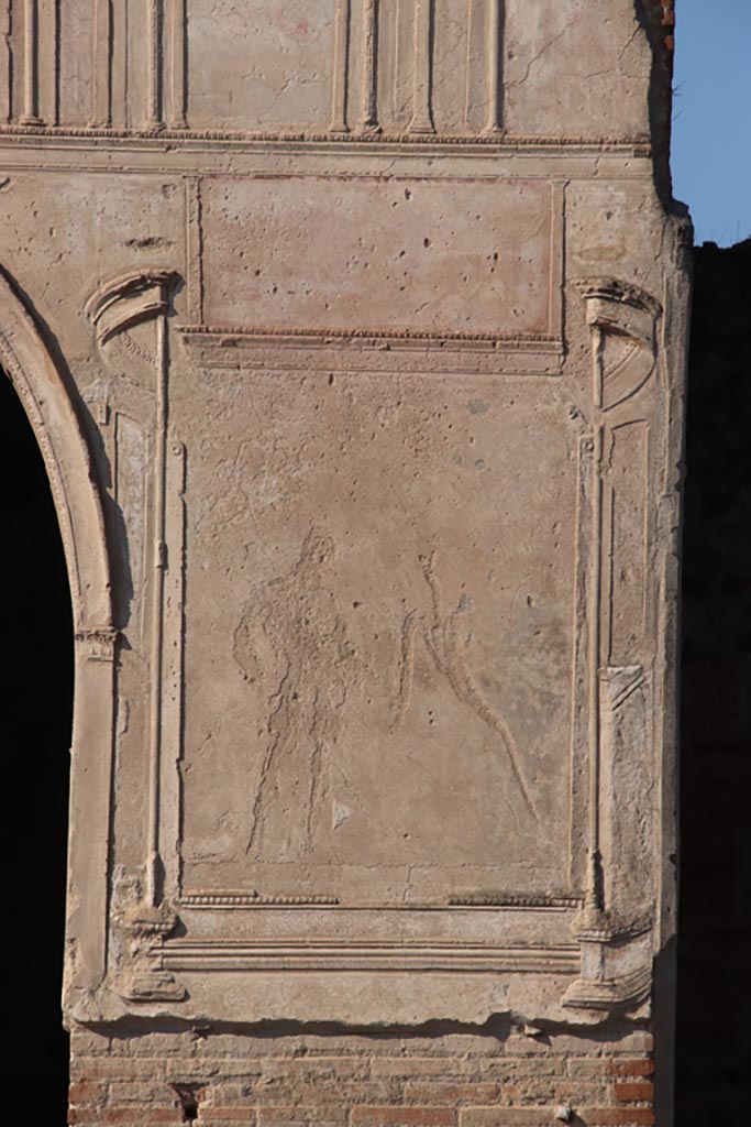 VII.1.8 Pompeii. October 2022.
Detail of remaining stucco on north side of arched entrance. Photo courtesy of Klaus Heese.