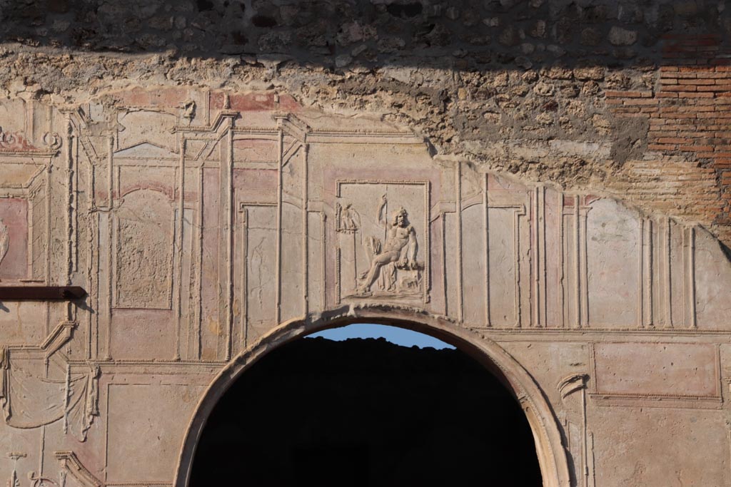 VII.1.8 Pompeii. October 2022.
Looking west towards upper arch of nymphaeum F with stucco relief of a seated Zeus. Photo courtesy of Klaus Heese.