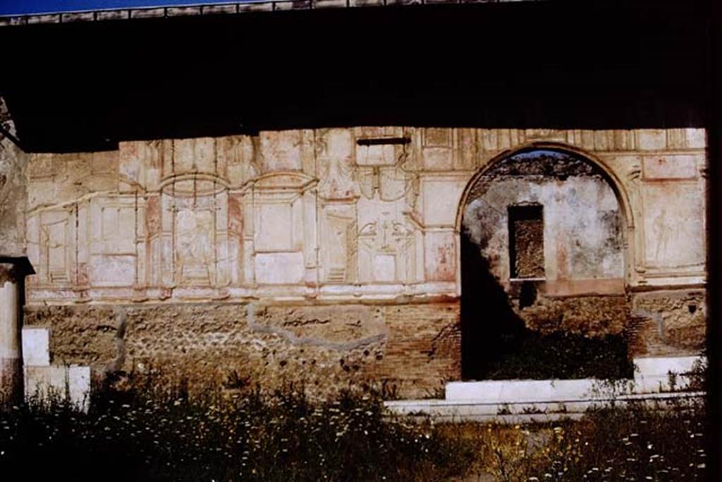 VII.1.8 Pompeii. 1968. South-west corner of gymnasium C. Stucco exterior walls of destrictarium E and nymphaeum F. Photo by Stanley A. Jashemski.
Source: The Wilhelmina and Stanley A. Jashemski archive in the University of Maryland Library, Special Collections (See collection page) and made available under the Creative Commons Attribution-Non Commercial License v.4. See Licence and use details.
J68f1054