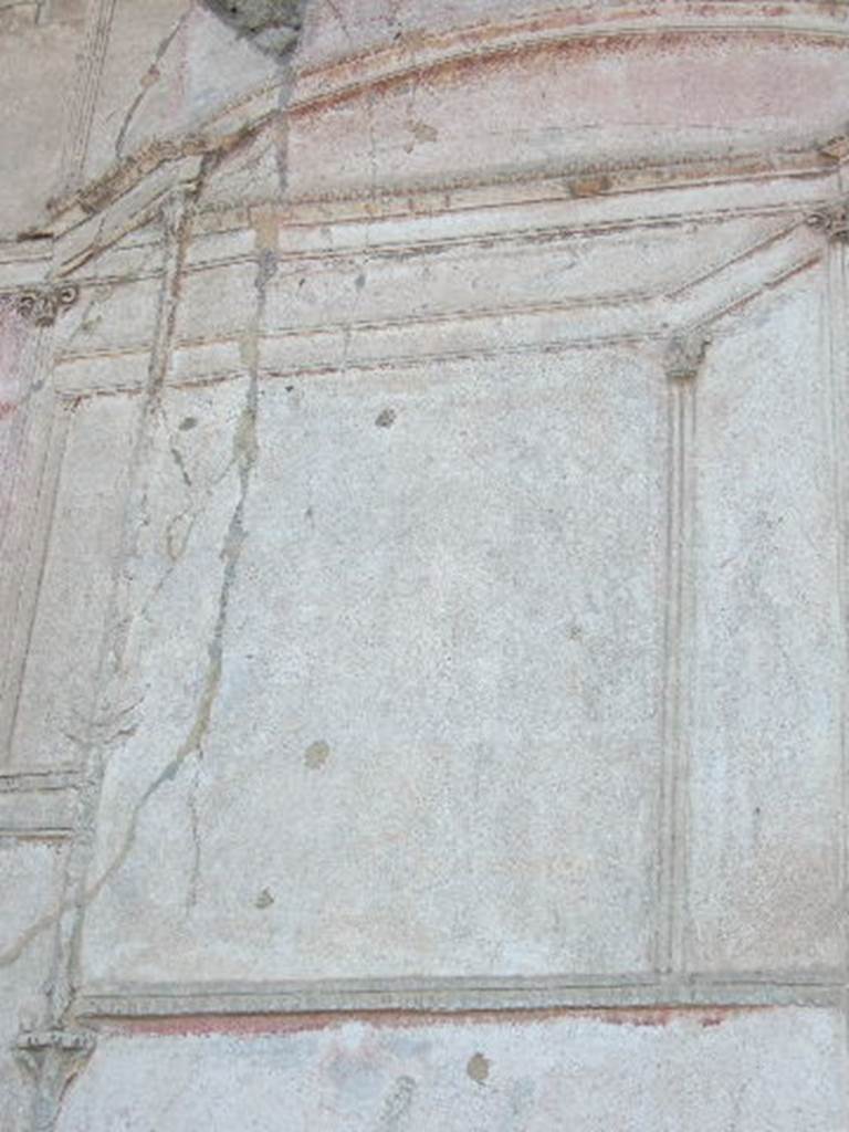 VII.1.8. Pompeii. September 2005. Detail of plaster on wall in south west corner of gymnasium C.