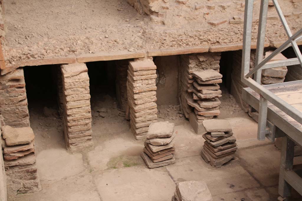 VII.1.8 Pompeii. April 2013. Men’s tepidarium 3, hypocaust system beneath level of flooring, looking east.
Photo courtesy of Klaus Heese.