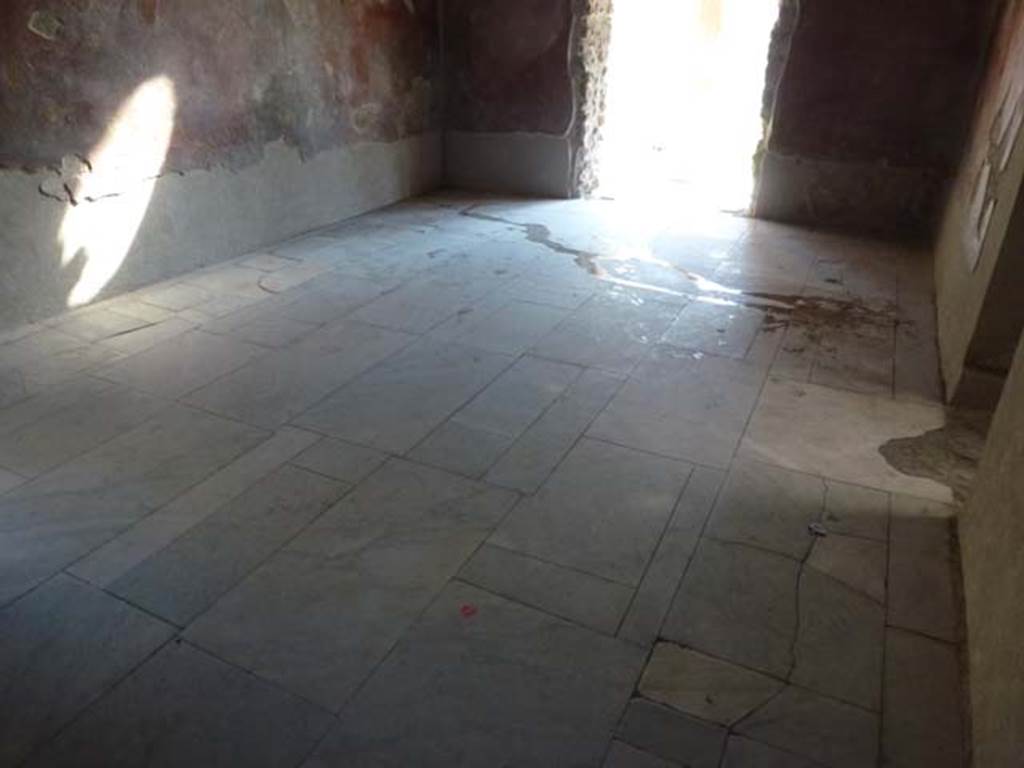 VII.1.8 Pompeii. June 2012. Looking west across floor of vestibule 1 towards entrance doorway from portico B. The doorway to frigidarium 4 is on the right. Photo courtesy of Michael Binns.