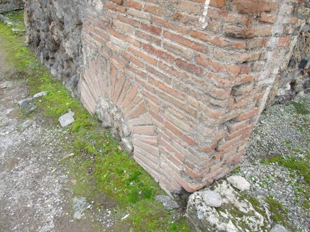 VII.1.24 Pompeii. December 2007. Base of pilaster to south of entrance.