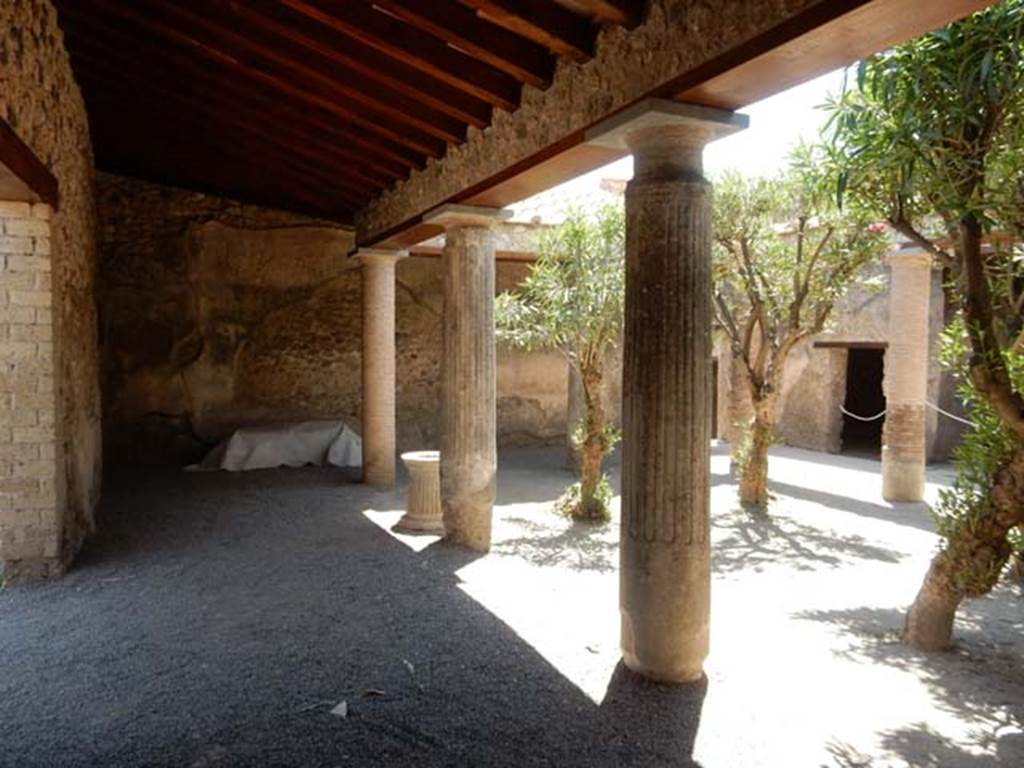 VII.1.25 Pompeii. May 2017. Looking south across peristyle 31 to doorway of room 34.
According to Niccolini this was a cubiculum but PPM simply describes it as a room.
Photo courtesy of Buzz Ferebee.
See Carratelli, G. P., 1990-2003. Pompei: Pitture e Mosaici: Vol. VI. Roma: Istituto della enciclopedia italiana, p. 345.
See Niccolini F, 1854. Le case ed i monumenti di Pompei: Volume Primo. Napoli. Strada Stabiana Casa No. 57, Tav. I.
