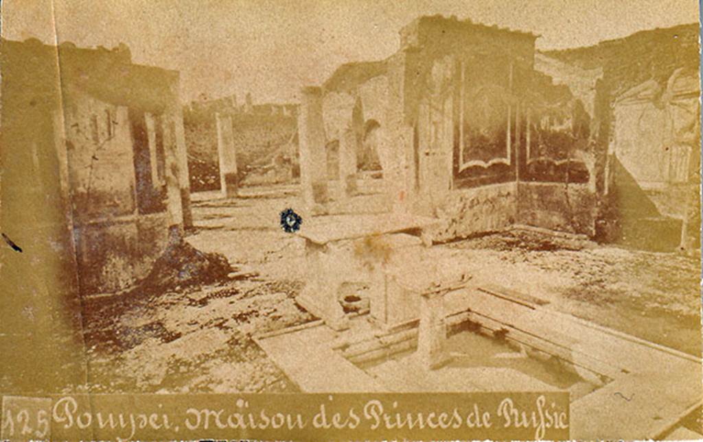 VII.1.25 Pompeii. Old undated 19th century photo. Looking north-west across atrium 24 through peristyle 31 to triclinium 32.
The marble tables, 24 on the Niccolini plan, can be seen on the impluvium.
Photo courtesy of Drew Baker.