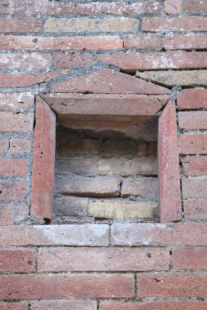 VII.1.26 Pompeii. December 2018. 
Plaque/niche between VII.1.26 and VII.1.27. Photo courtesy of Aude Durand.


