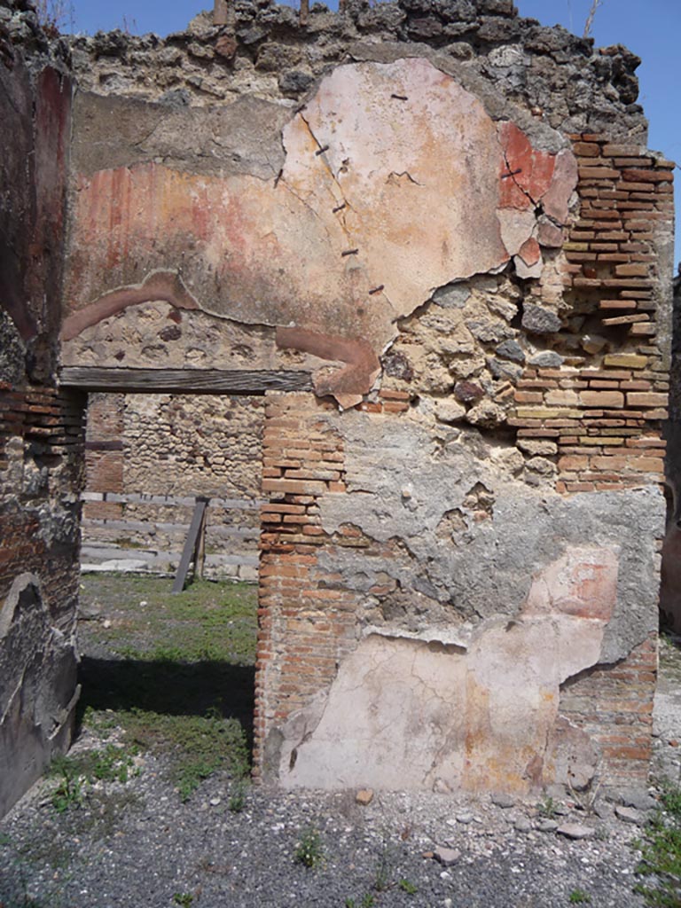 VII.1.36 Pompeii. October 2009.
Looking towards north-west corner of atrium, with doorway to VII.1.37 in north wall.
Photo courtesy of Jared Benton.