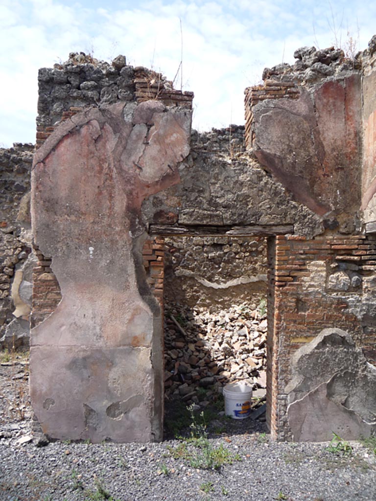 VII.1.36 Pompeii. October 2009.
Looking west towards doorway to room in north-west corner of atrium. Photo courtesy of Jared Benton.