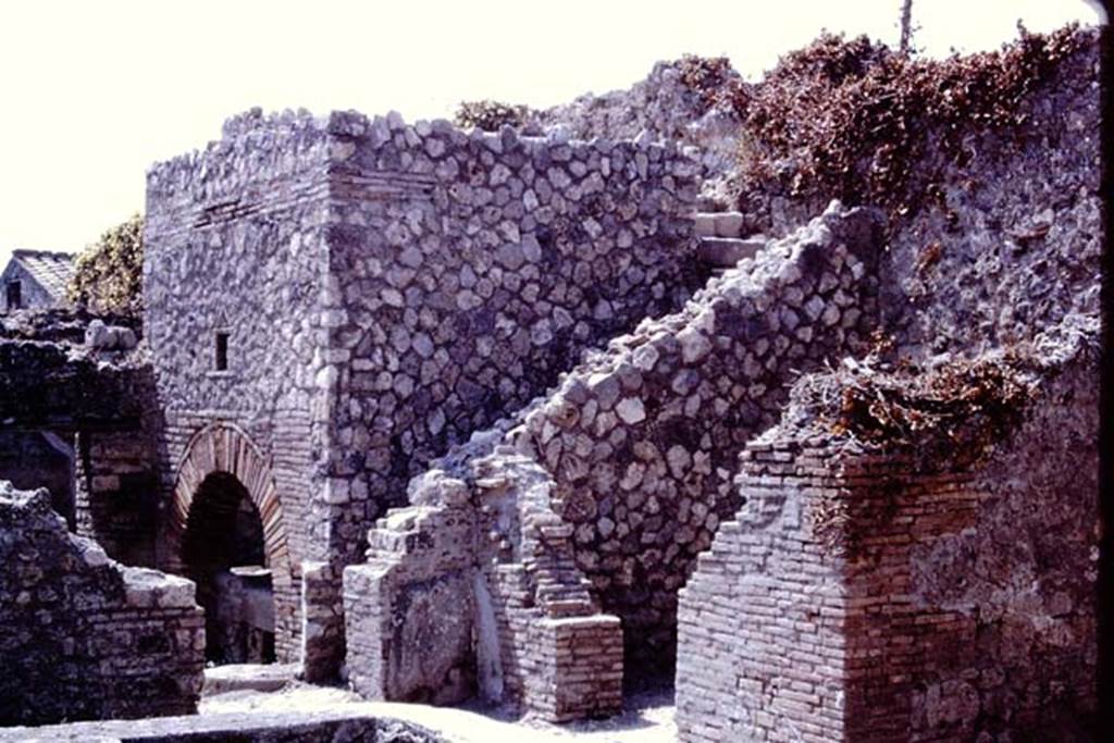 VII.1.36 Pompeii. 1966. Looking towards south wall of ala, on right, doorway to room in south-west corner of atrium, steps and oven, on left. Photo by Stanley A. Jashemski.
Source: The Wilhelmina and Stanley A. Jashemski archive in the University of Maryland Library, Special Collections (See collection page) and made available under the Creative Commons Attribution-Non Commercial License v.4. See Licence and use details.
J66f0312