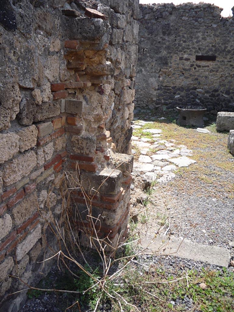 VII.1.36 Pompeii. October 2009.
Looking south through doorway to milling area from south-east corner of atrium.
Photo courtesy of Jared Benton.