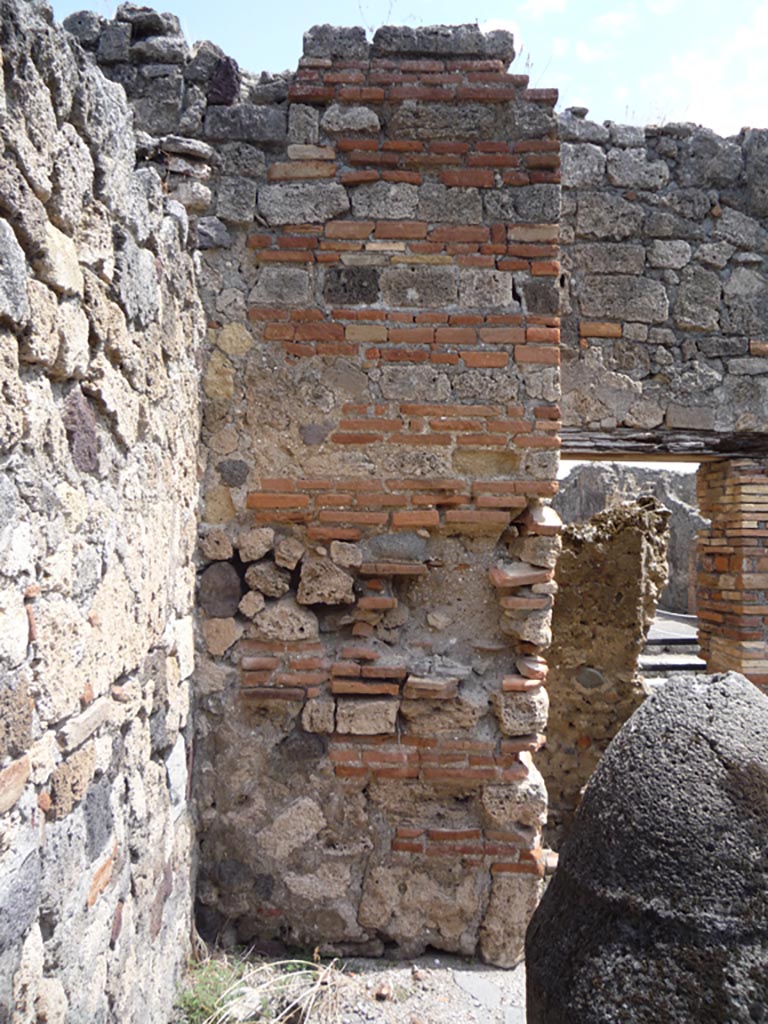 VII.1.36 Pompeii. October 2009.
North-east corner of room, with doorway to latrine at rear. Photo courtesy of Jared Benton.
