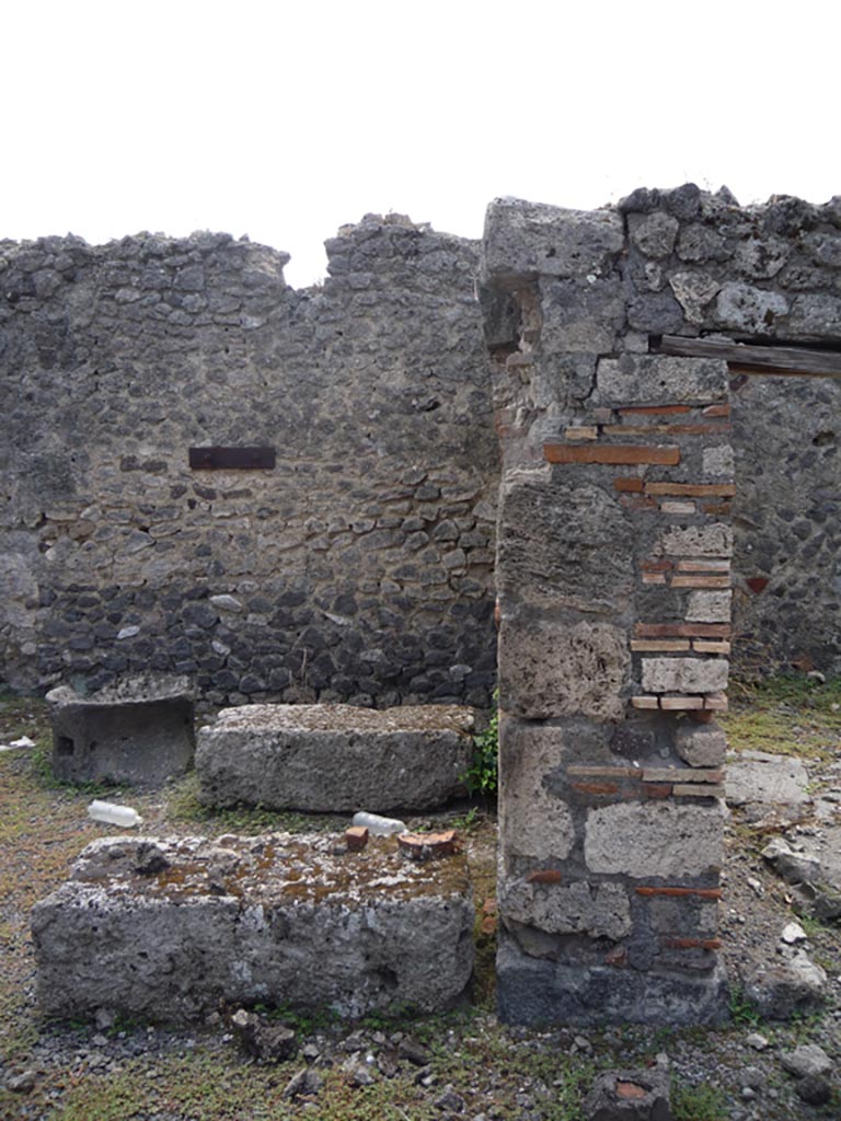 VII.1.36 Pompeii. October 2009.
Looking south towards pilaster dividing two rooms on south side of oven. Photo courtesy of Jared Benton.