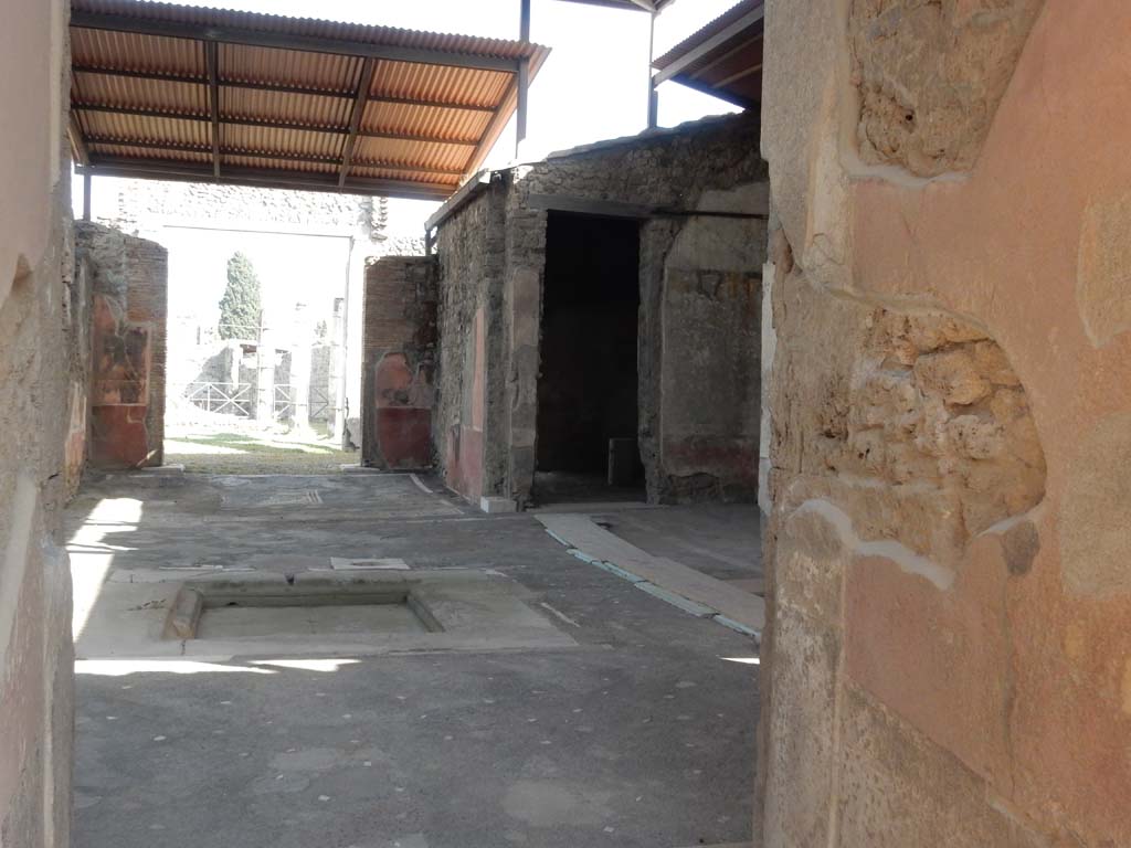 VII.1.40 Pompeii. June 2019.
Looking towards tablinum 11 and south-west corner of atrium, with doorway to oecus 12 and the west ala, 3a. Photo courtesy of Buzz Ferebee.