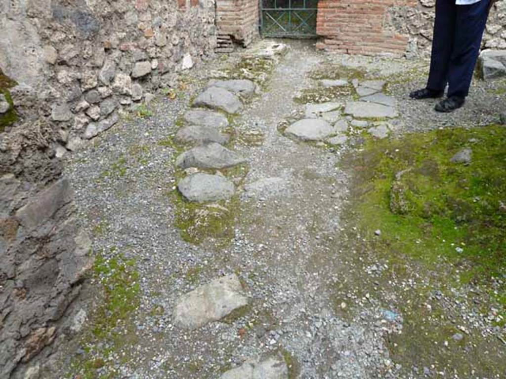 VII.1.46 Pompeii. May 2010. Floor of entrance room 16.