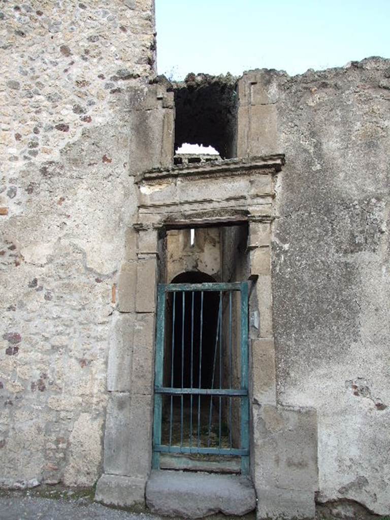 VII.1.48 Pompeii. December 2006. Small doorway of Stabian Baths.