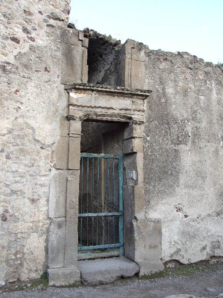 VII.1.48 Pompeii. December 2006. Small doorway of Stabian Baths.