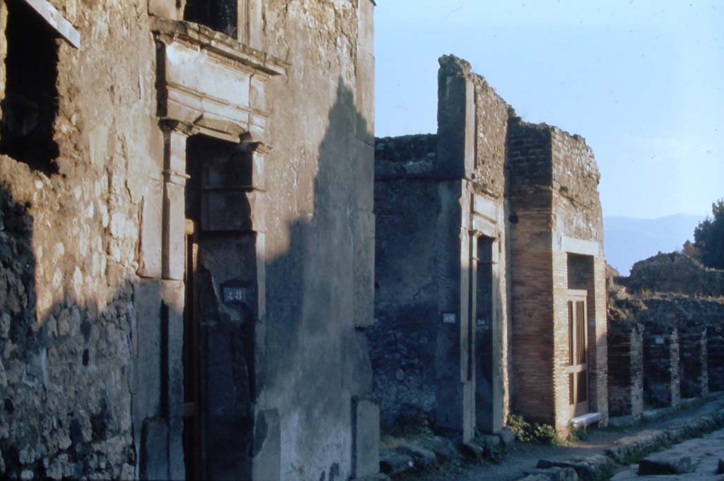 VII.1.48, Pompeii, on left. 4th December 1971. Looking south on Vicolo del Lupanare.
Photo courtesy of Rick Bauer, from Dr.George Fay’s slides collection.
