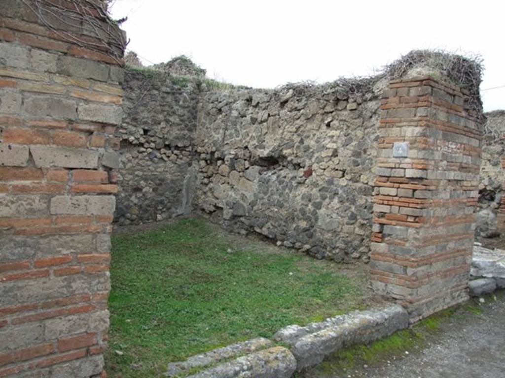 VII.2.4 Pompeii. Shop. December 2007. Entrance and north wall.