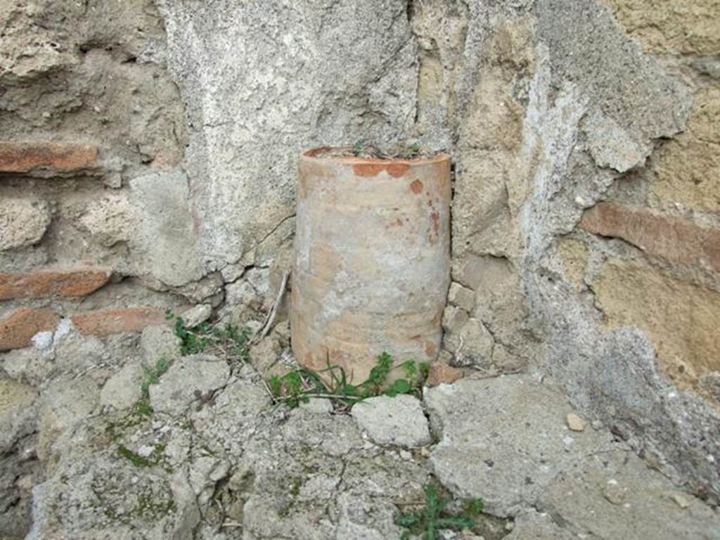 VII.2.12 Pompeii.  Shop.  December 2007.  Terracotta waste pipe from upper floor.