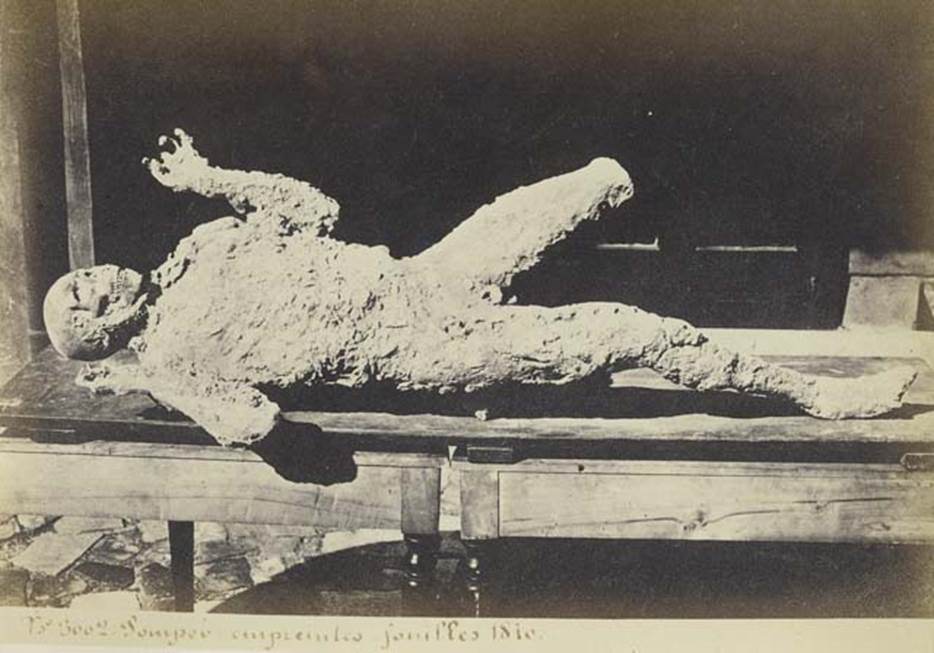 VII.2.16 Pompeii. Undated photograph by Amodio, numbered 3002, from an album dated c.1873. One of the seven skeletons found in the house on 12th March 1868.
Photo courtesy of Rick Bauer.