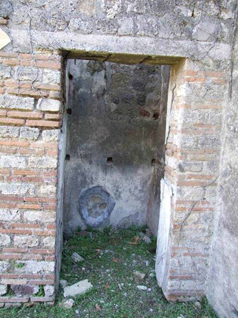 VII.2.18 Pompeii. March 2009. Doorway to Room 15. Cupboard.