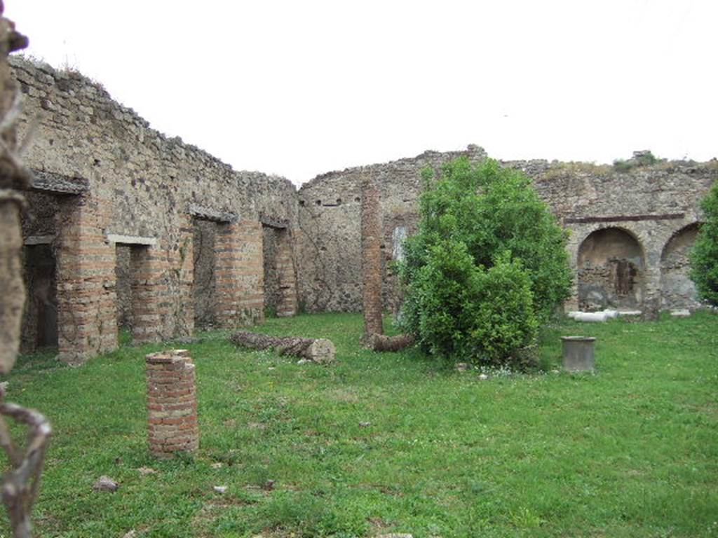VII.2.20 Pompeii. May 2006.  North East side of Peristyle. Photo taken from VII.2.23 