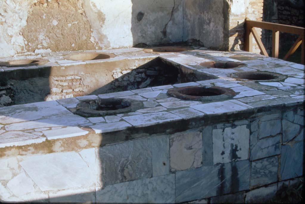VII.2.32 Pompeii. 4th December 1971. Looking east across marble clad counter.
Photo courtesy of Rick Bauer, from Dr.George Fay’s slides collection.