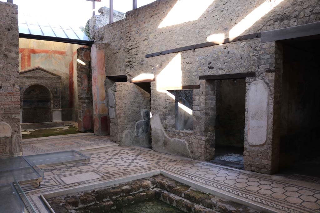 VII.2.45, Pompeii. December 2018. Looking towards doorways to rooms on east side of atrium. Photo courtesy of Aude Durand.