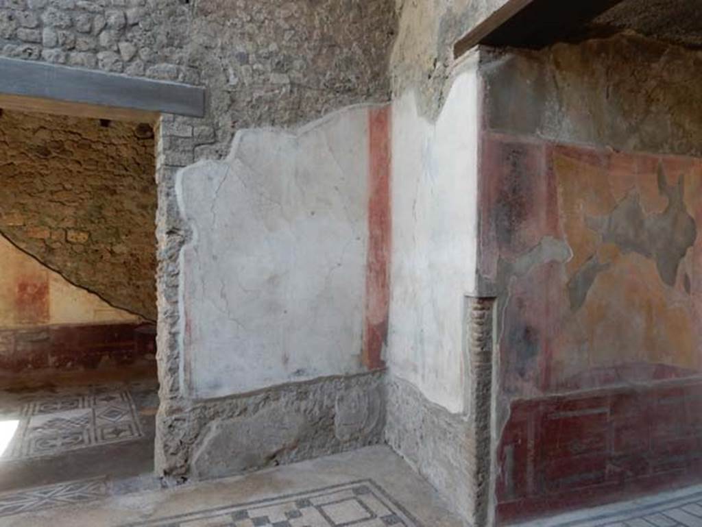 VII.2.45 Pompeii, May 2018.
Doorway to triclinium, on left, south-east corner of atrium, and doorway to entrance corridor, on right.
Photo courtesy of Buzz Ferebee.
