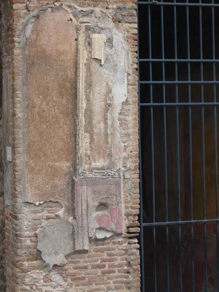 VII.2.45 Pompeii. May 2012. Detail from west side of entrance doorway.
Photo courtesy of Buzz Ferebee.