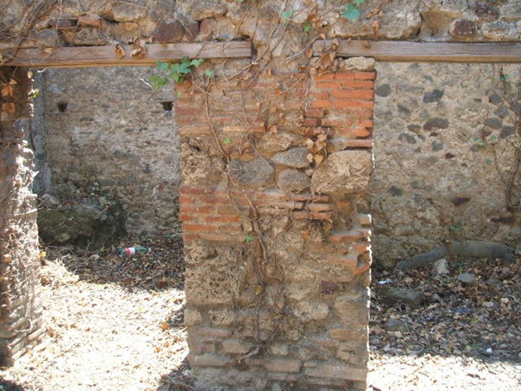 VII.3.4 Pompeii. May 2005. Doorways to Kitchen and Storeroom on south side of garden area.