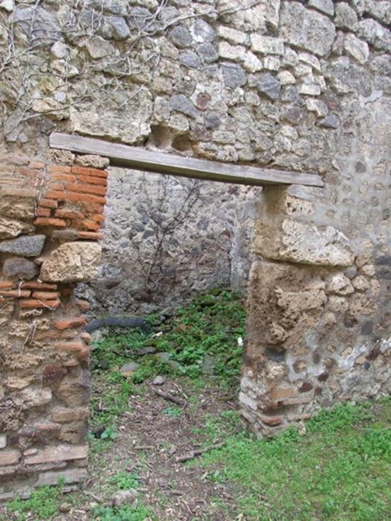 VII.3.4 Pompeii. March 2009. Doorway to small room or storeroom in south wall, on west side of garden.
