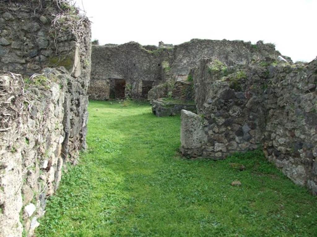 VII.3.4 Pompeii. March 2009. Corridor room on west side of rear room, leading to a yard or area with oven.