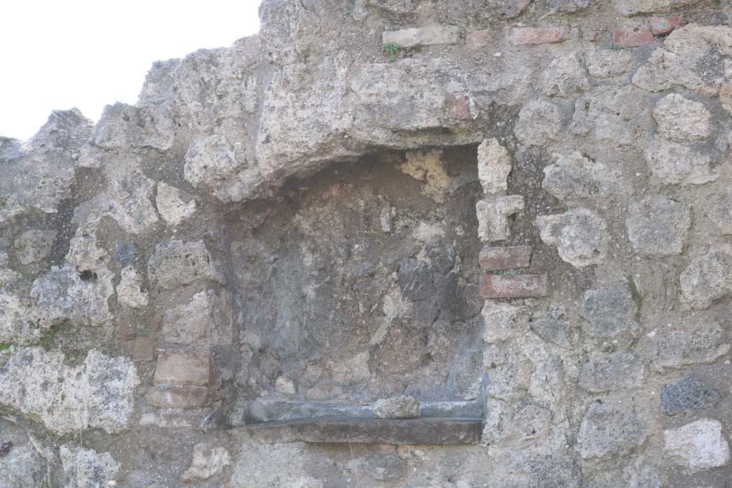 VII.3.8 Pompeii. December 2018. Niche in west wall of shop “l (L)”. Photo courtesy of Aude Durand.
This was originally a niche which was later walled up and plastered over in red like the rest of the room.
See Carratelli, G. P., 1990-2003. Pompei: Pitture e Mosaici: Vol. VI. Roma: Istituto della enciclopedia italiana, p. 855.