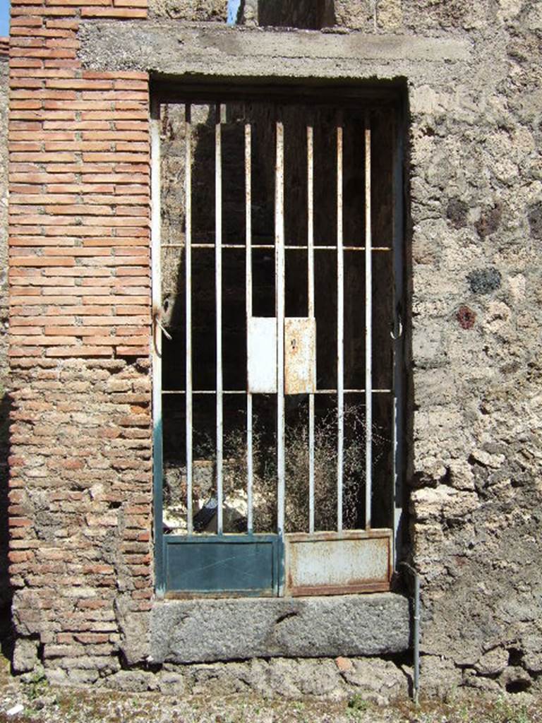 VII.3.27 Pompeii. May 2006. Steps. According to Della Corte, the following graffito inscription was found to the left of the stairs:
Euplia  hic
cum  hominibus  bellis
M   M         [CIL IV 2310 b]
See Della Corte, M., 1965.  Case ed Abitanti di Pompei. Napoli: Fausto Fiorentino. (p.149)

According to Varone, this translated as “Euplia was here with thousands of good-looking men”.  In the third line the M M, (two thousand), presumably referred to any number of thousands of good-looking men !
See Varone, A., 2002. Erotica Pompeiana: Love Inscriptions on the Walls of Pompeii, Rome: L’erma di Bretschneider. (p.71) 

On the pilaster to the right of the stairs, was written:
Capellam
II vir(um) o(ro) v(os) f(aciatis)
Phoebu[s f]acit    [CIL IV 2949]
See, Della Corte, above.

