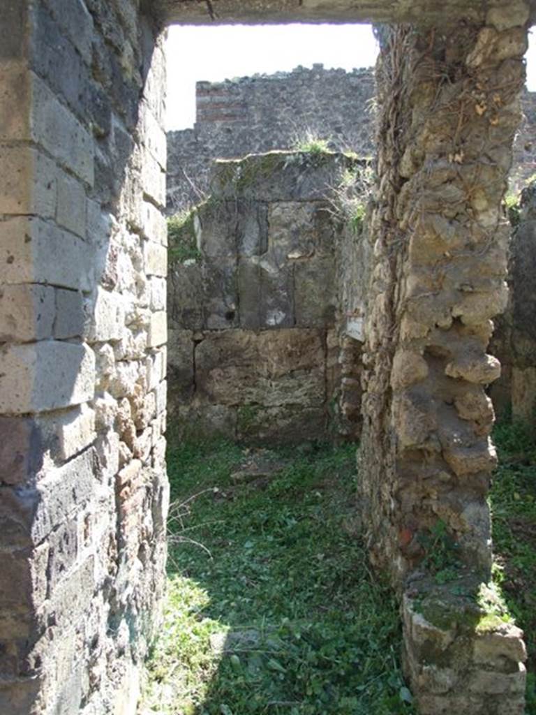 VII.3.29 Pompeii. March 2009. Doorway to Room 15. Kitchen and Latrine. Looking south.
