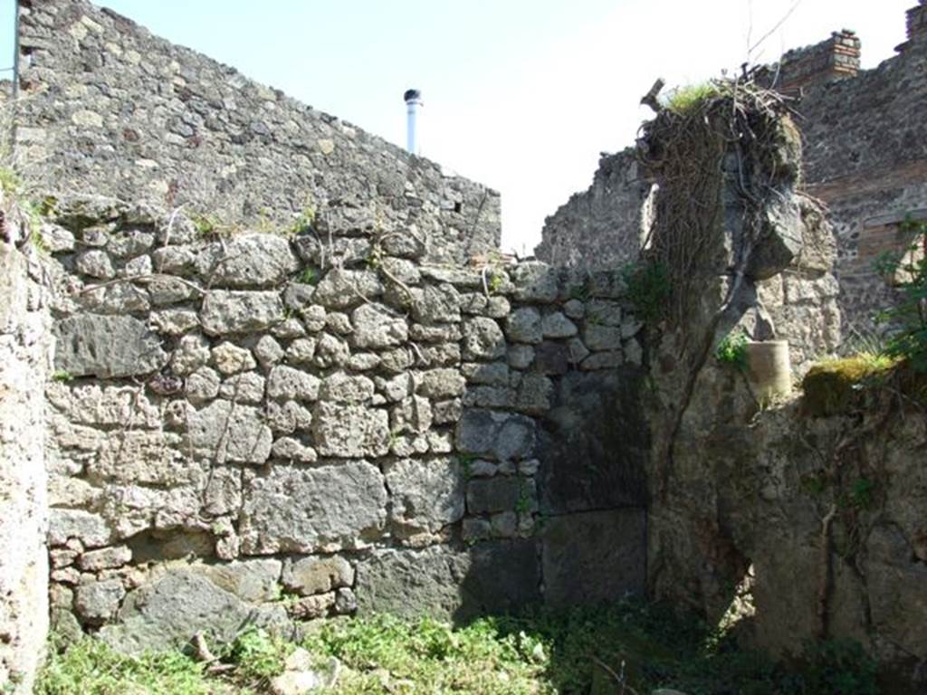 VII.3.29 Pompeii. March 2009. Room 15. East wall of Kitchen, with downpipe in south east corner.