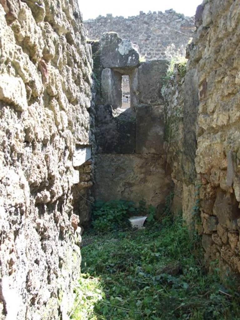 VII.3.29 Pompeii. March 2009. Room 16, in foreground, Stairs to upper floor. Iin background, small door from Kitchen to area under stairs.